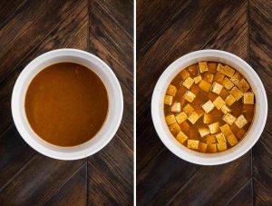 2 photos showing a bowl of marinade and another with tofu cubes added to the marinade.